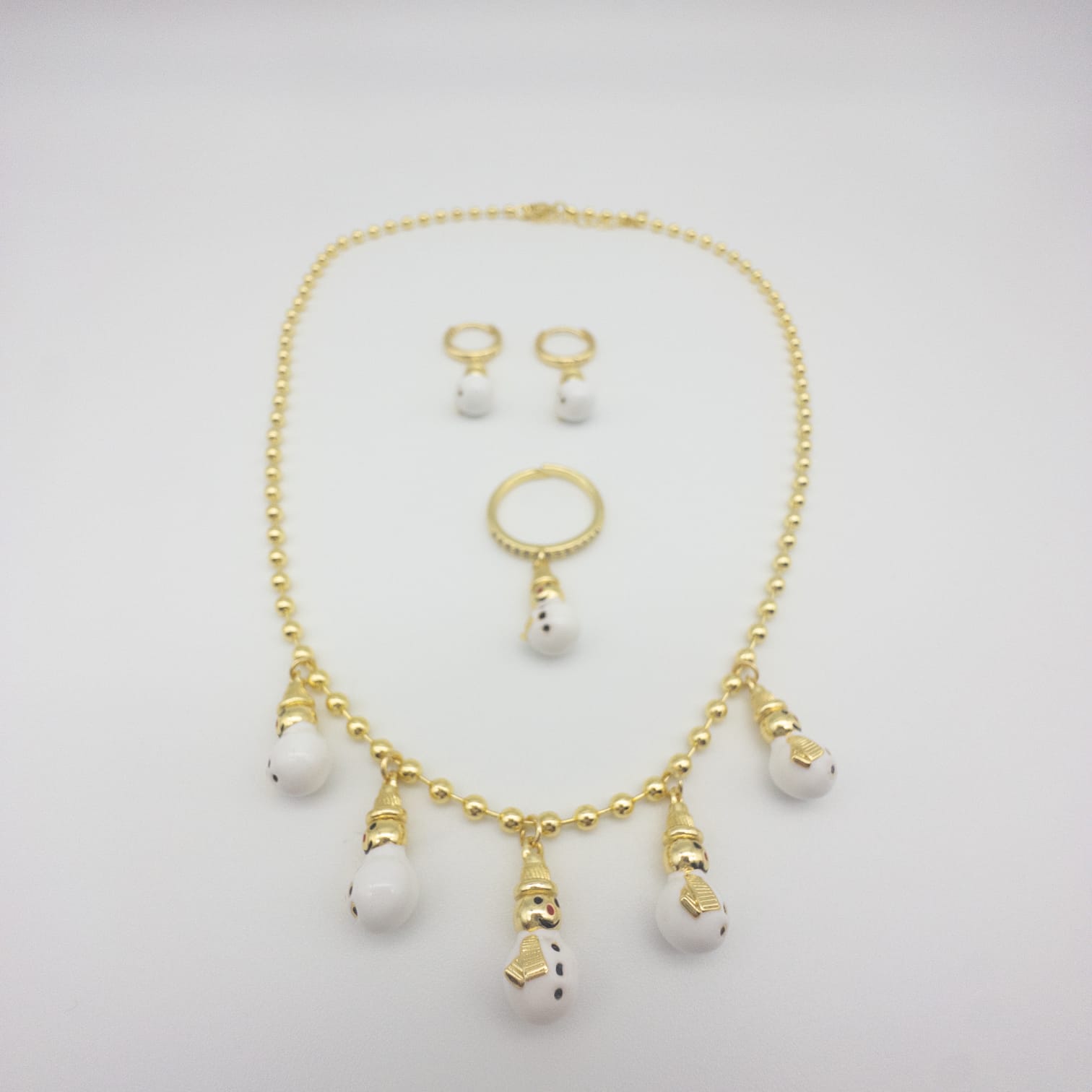 Goldfarbenes Weihnachts-Schmuckset Mit Schneemann-Motiven
