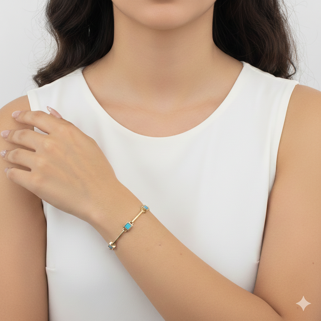 Elegantes Goldfarbenes Armband Mit Türkisen Quadratischen Steinen