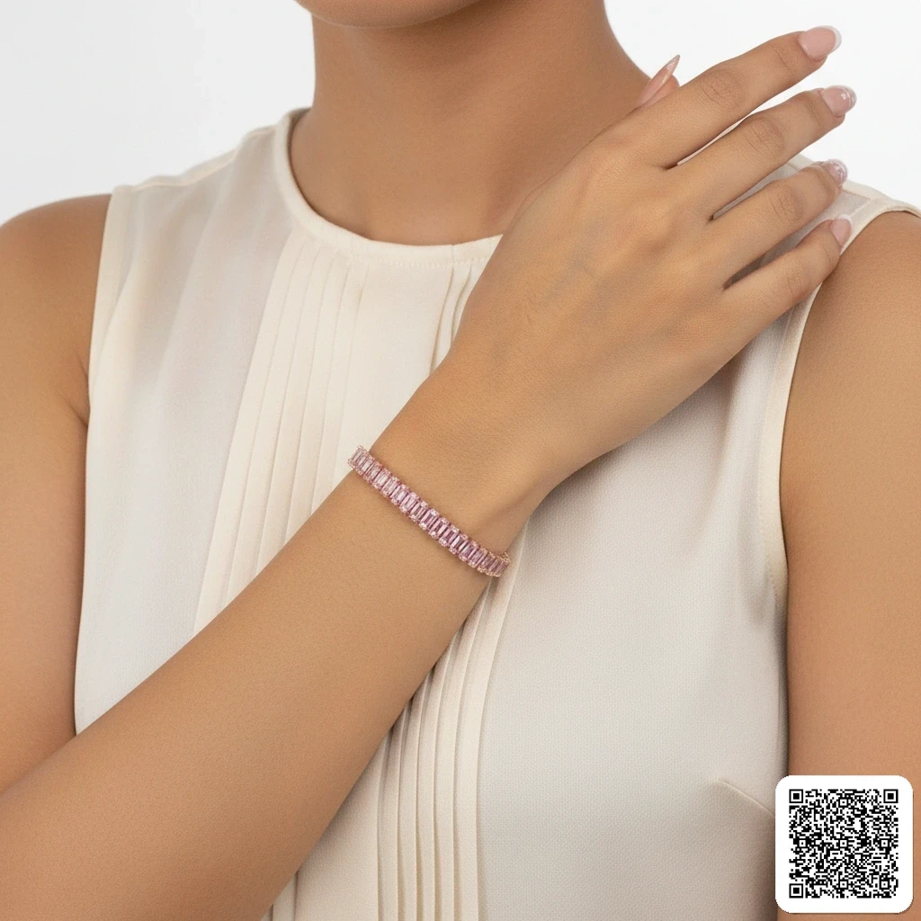 Elegantes Tennisarmband Mit Rosa Baguette-Zirkonia Goldfarben