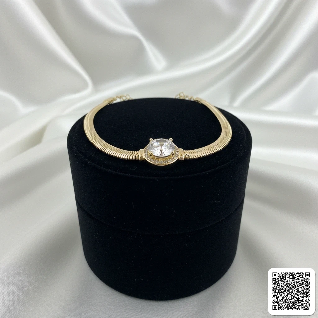 Elegantes Goldfarbenes Armband Mit Rundem Zirkonia-Stein