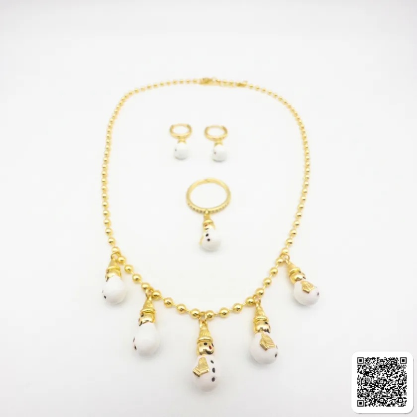 Goldfarbenes Weihnachts-Schmuckset Mit Schneemann-Motiven