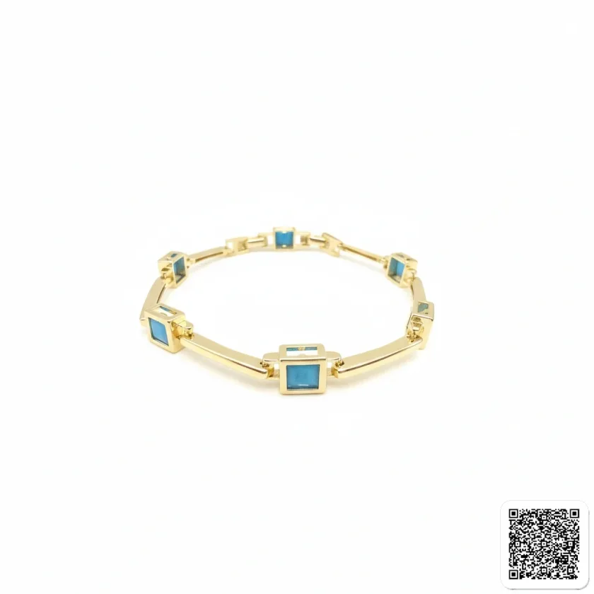 Elegantes Goldfarbenes Armband Mit Türkisen Quadratischen Steinen