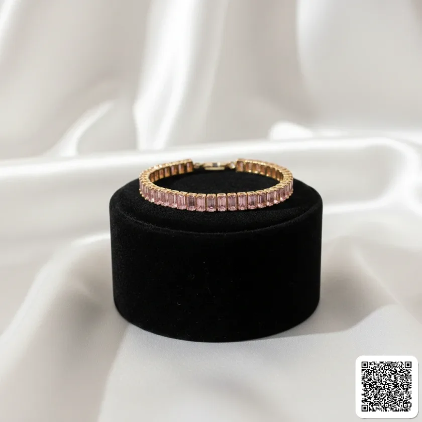 Elegantes Tennisarmband Mit Rosa Baguette-Zirkonia Goldfarben